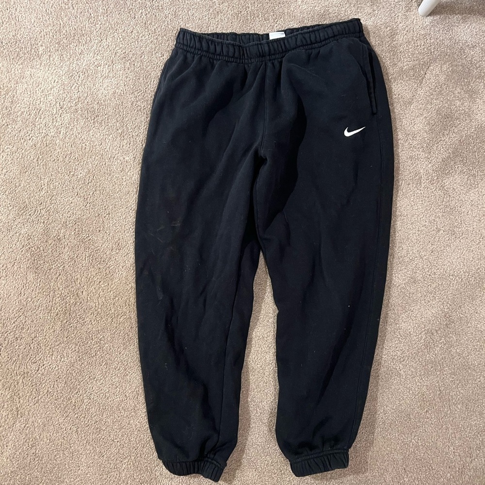 Nike sweats in black size large. they have front pockets and one back pocket.